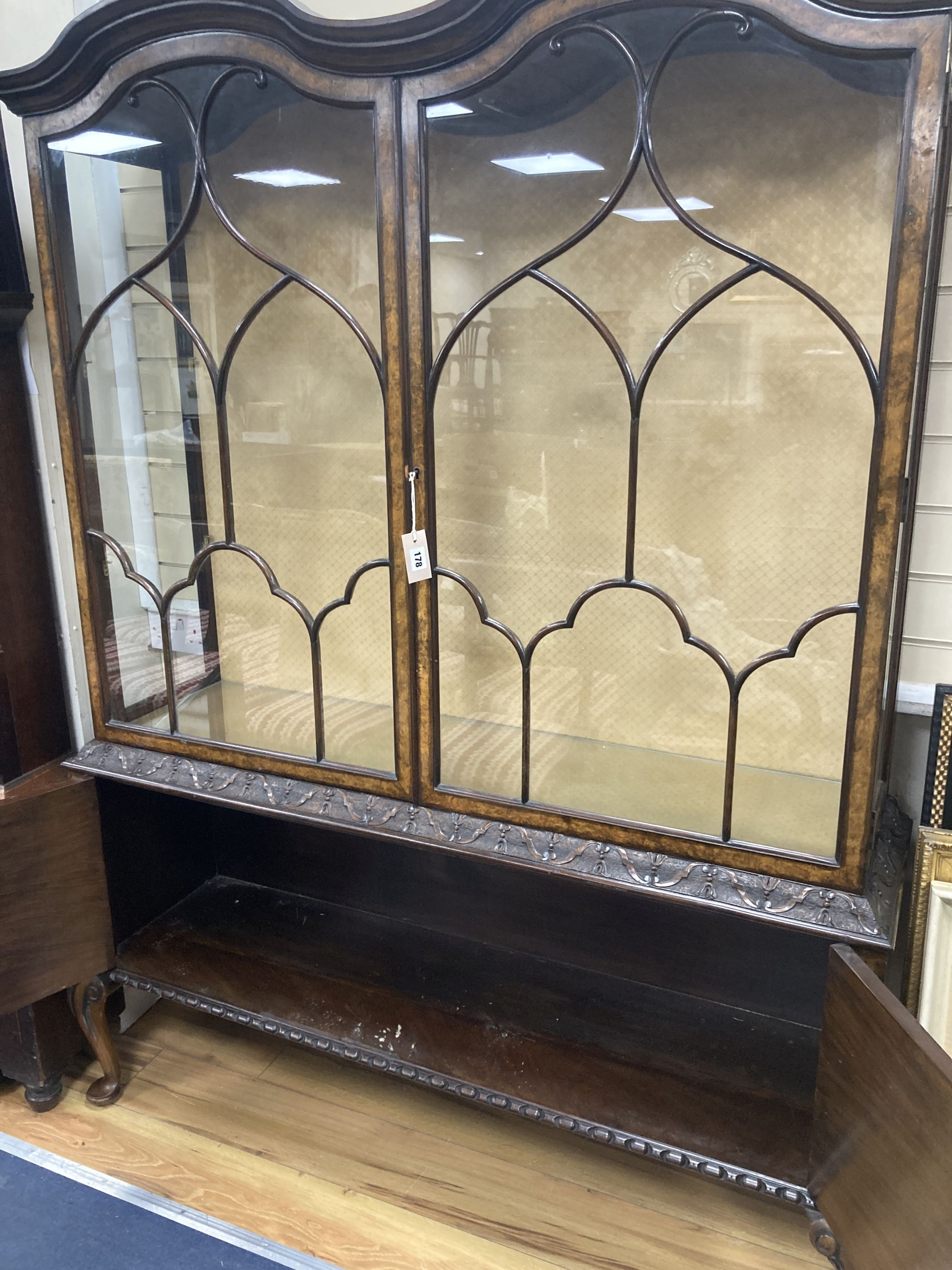 A Queen Anne revival burr walnut glazed china display cabinet, combined cupboard, length 136cm, depth 40cm, height 184cm